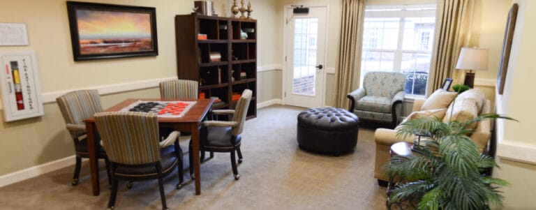 Bright common area with seating and games