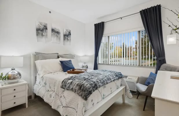 Cozy private bedroom with a view and decor