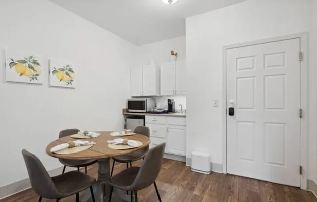 Bright kitchenette area with a dining table