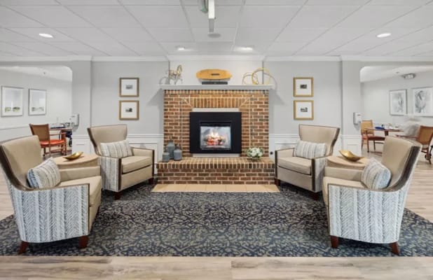 Cozy common area with seating and fireplace