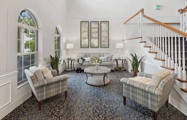 Cozy common area with seating and decorative plants