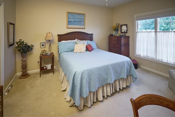 Cozy resident bedroom with a bed and furnishings