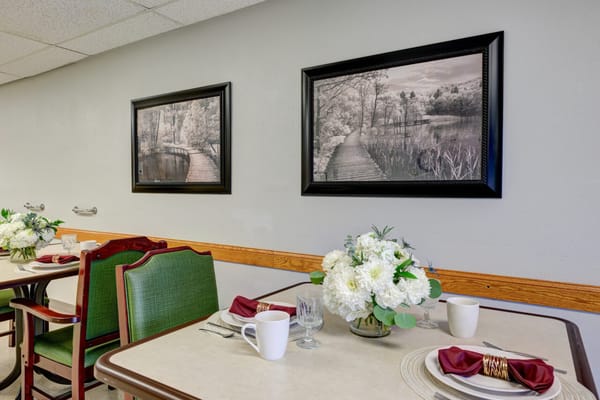 Dining area with tables set for a meal