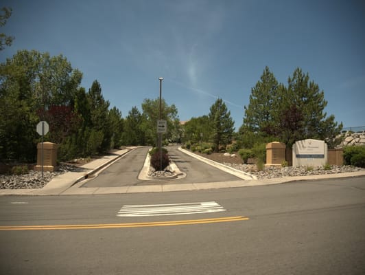 Entrance road leading to a senior living facility