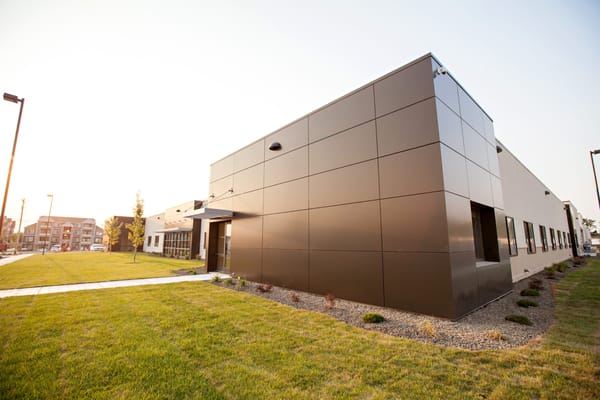 Exterior view of a modern assisted living facility building