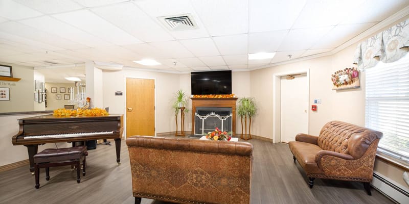 Interior view of a cozy common area with seating