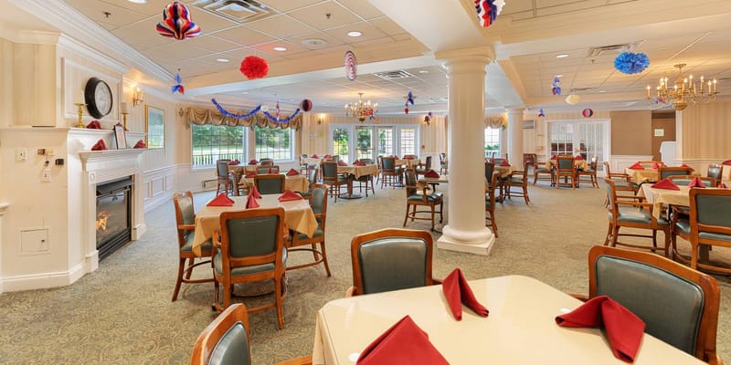 Dining room with festive decorations and empty tables