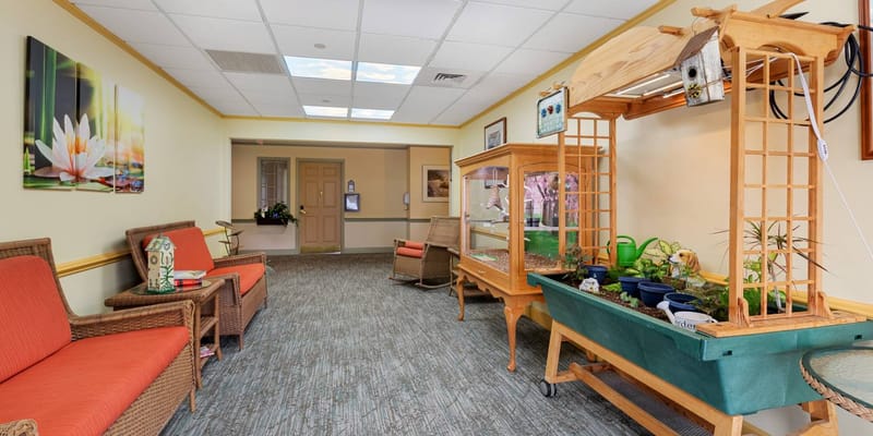 Interior view of a cozy common area with seating