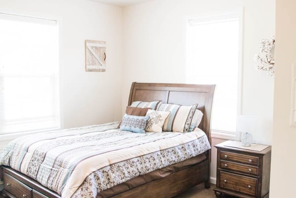 Cozy private bedroom with natural light
