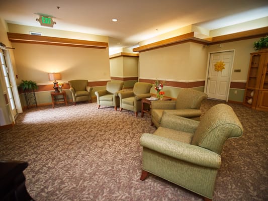 Cozy lounge space with armchairs and a lamp