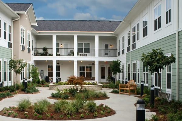 Beautiful courtyard with seating and landscaping at The Blake at Bossier City