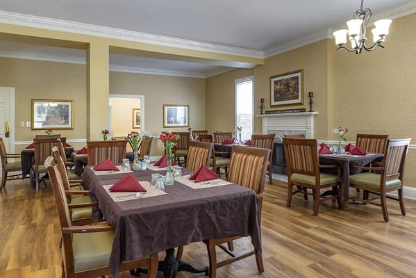 Well-appointed dining room with neatly set tables