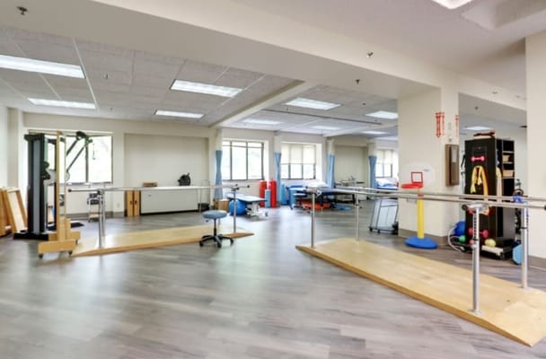 Interior photo of a therapy room with equipment