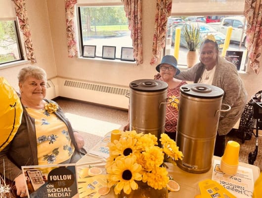 Residents enjoying refreshments in a common area