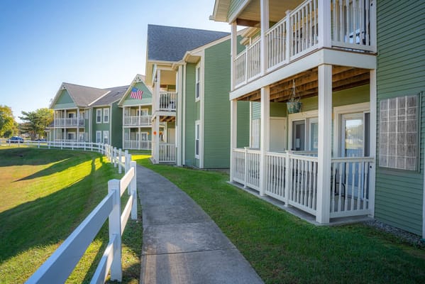 Exterior view of a senior living facility with balconies