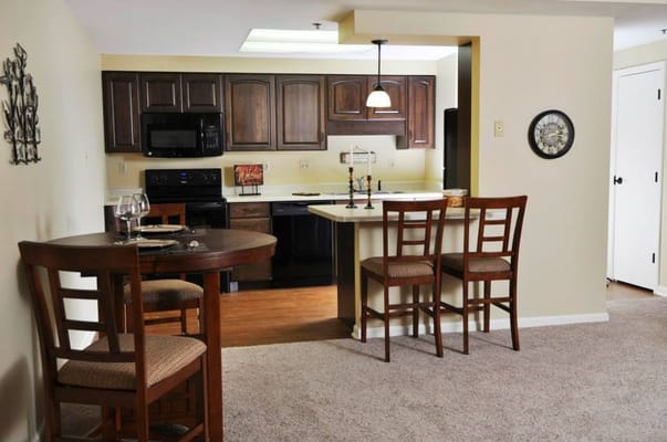 Modern kitchenette area with dining space
