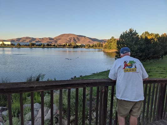 A resident enjoying the view by the lake