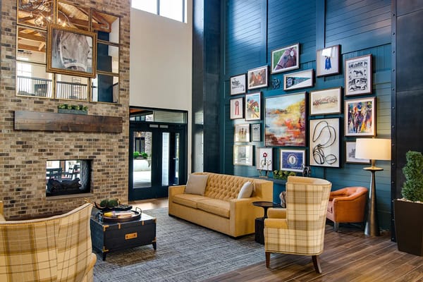 Cozy lobby area with sofas and artwork
