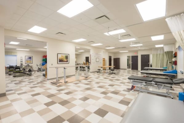 Interior view of a rehabilitation gym with equipment