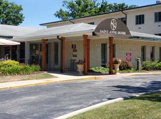 Entrance of Saint Anne Home with welcoming landscaping
