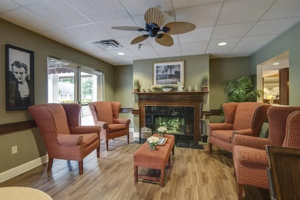 Cozy living room with comfortable seating and a fireplace