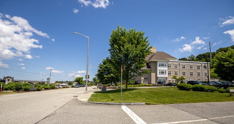 Exterior view of assisted living facility with landscaping