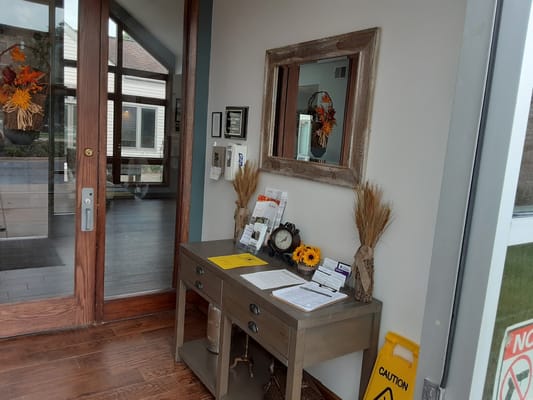 Entryway with a wooden table and decor