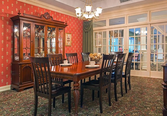 Dining room with a large table and elegant decor
