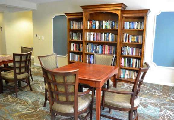 Common area with bookshelves and tables