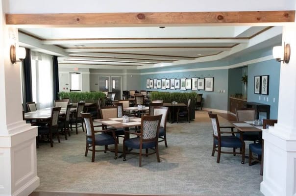Bright and inviting dining area with tables and chairs