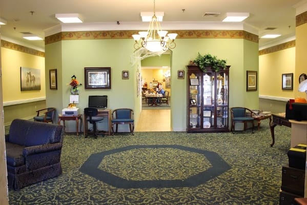 Bright interior common area with seating and decor