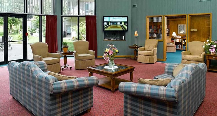 Common area with seating and a television