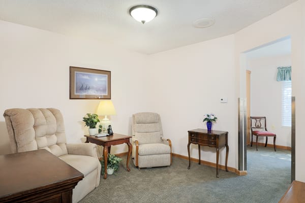 Cozy private resident room with seating area