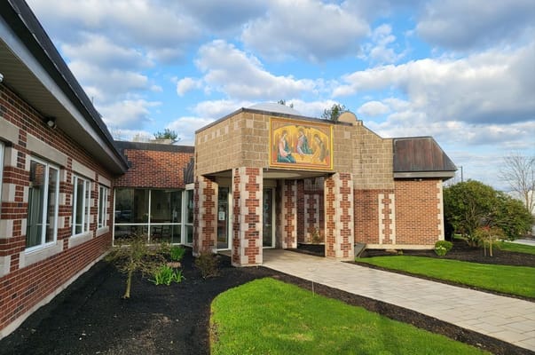 Exterior view of Holy Trinity Nursing and Rehabilitation Center entrance