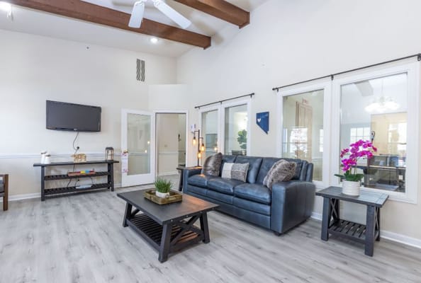 Cozy common area with seating and natural light