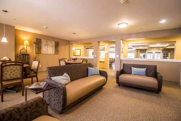 Cozy lounge area with sofas and dining space