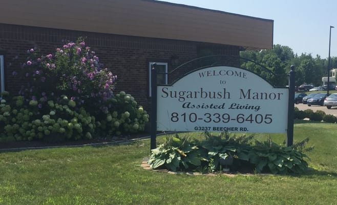 Exterior sign for Sugarbush Manor assisted living