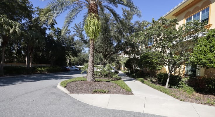 Exterior view of a winding pathway outside the facility