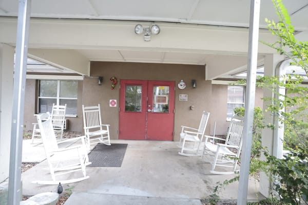 Outdoor seating area with rocking chairs