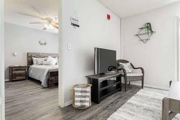 Cozy resident room with a bed and TV