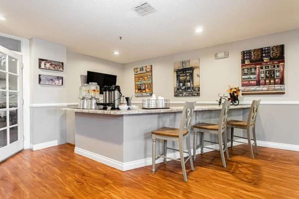 A cozy dining area with a countertop and decor