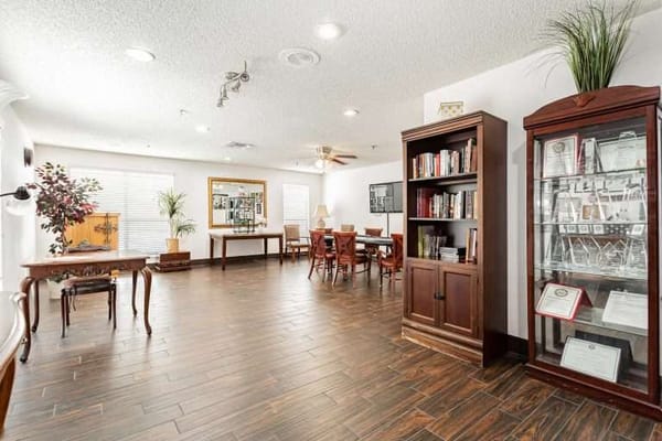 Bright common area with seating and bookshelves