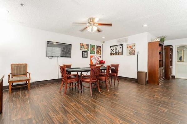 Interior common area with dining furniture and decor