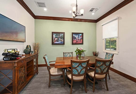A common area with a dining table and decor