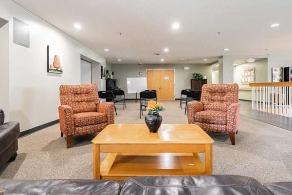 Interior common area with chairs and table