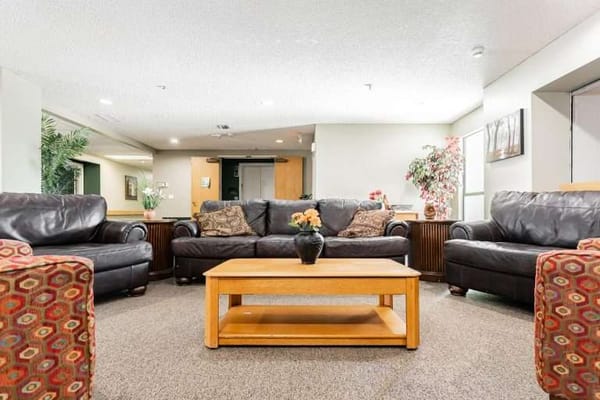 Common area with seating and decorative plants