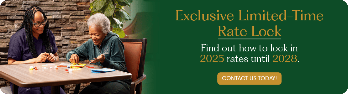 Two residents enjoying a game at a table