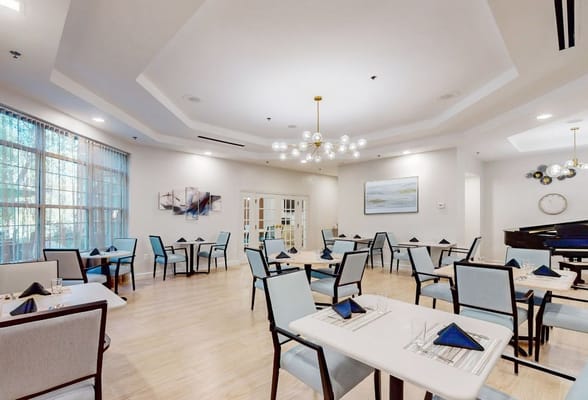 Bright dining area with tables set for meals