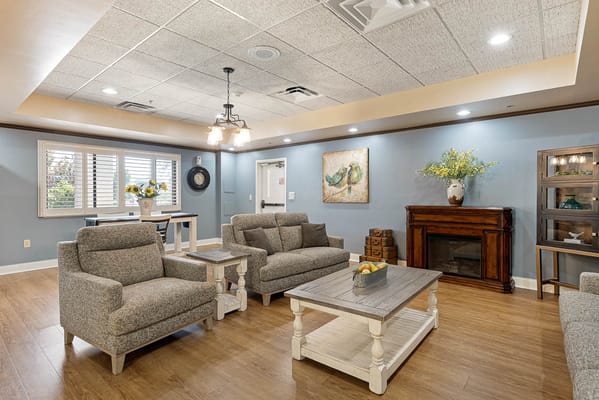 Bright common area with comfortable seating and decor