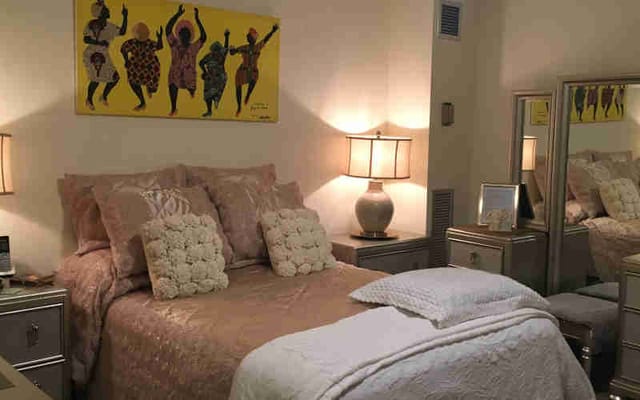 Cozy resident room with bed and decorations